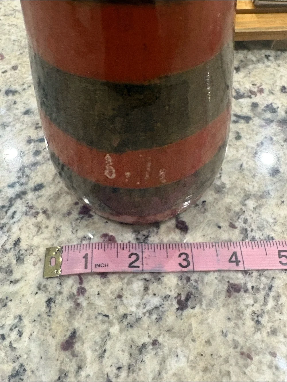 Orange and gold striped vase unbranded with crazing issues